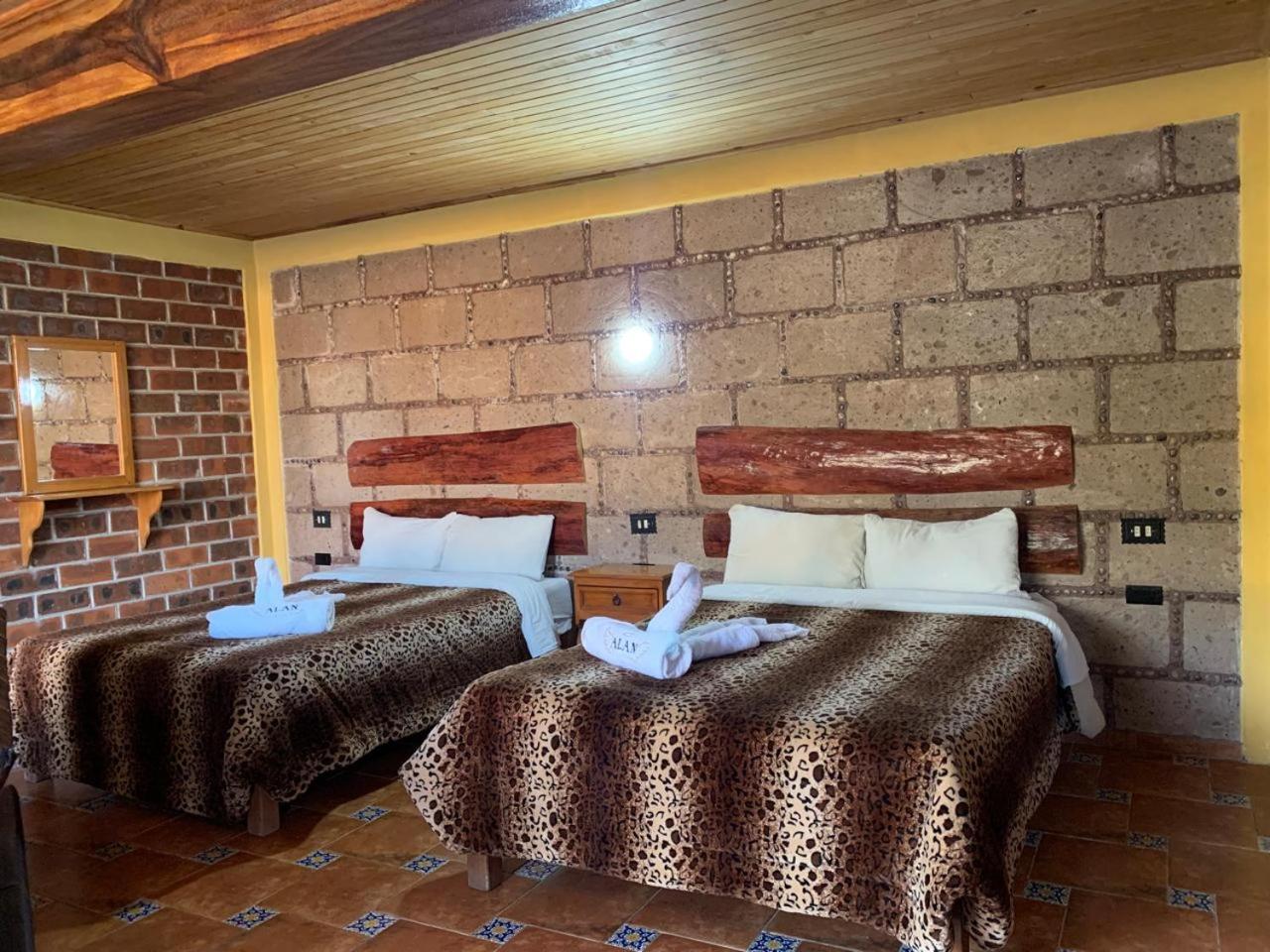 Hotel Y Cabanas Alan Чигнауапан Экстерьер фото